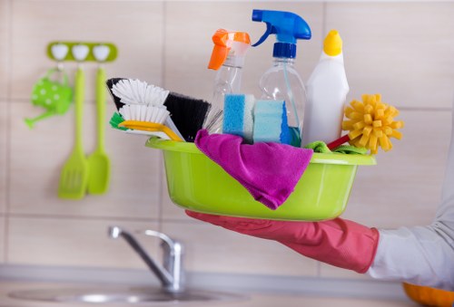Staff member using carpet cleaning equipment safely